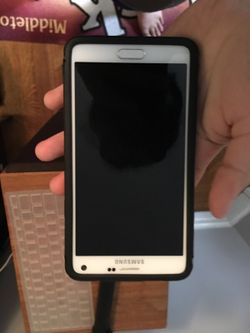 Galaxy note 4 with wireless charging dock and back