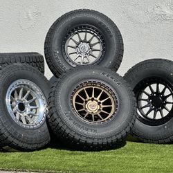 NEW 17” Lock Off Road Wheels 6x139 Rims 33” A/T Tires Chevy Silverado Toyota Tacoma 4Runner GMC Sierra Yukon