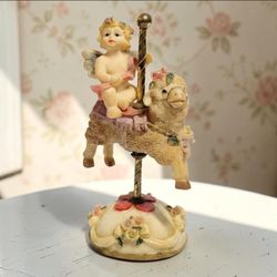 K’s Collection Limited Edition Cherub Angel On Sheep Carousel Ceramic Collection. This is a vintage K's Collection Special Edition figurine featuring 