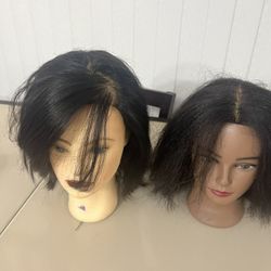 Clic International Courtney Female Long Hair Mannequin for Cosmetology. One is a no name. Both has writing on them. 