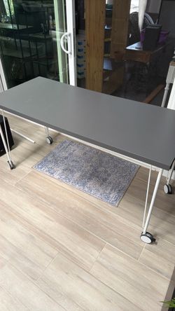Ikea Table with wheels L55” W23.5 H28.75