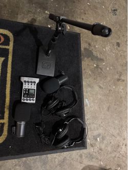 Podcast equipment comes with two mics one boom