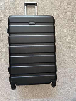 Large Hard-sided Suitcase on Wheels