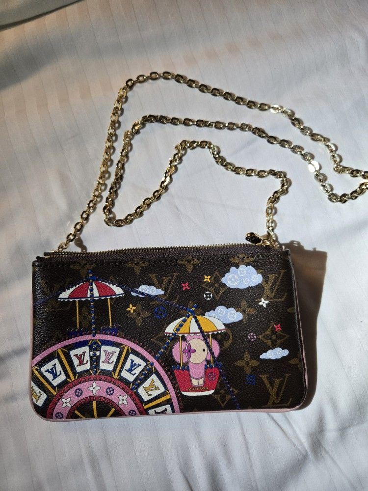 Louis Vuitton
Monogram Vivienne Xmas Double Zip Pochette 2020