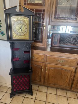 Vintage Victorian style clock with shelves and storage