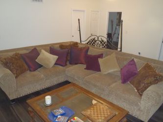 Custom made Sofa -Sectional with down filling and Pillows.