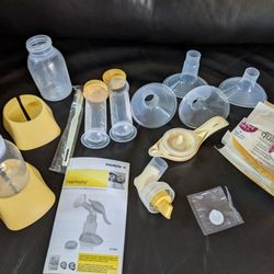 Medela Hand Pump, Bottles And Various Flanges