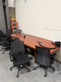 Conference table with 10 chairs