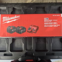 2 Milwaukee M18 XC 5.0 Batteries with Charger 
