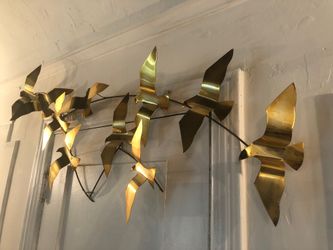 10 brass birds in flight-Curtis Jere?