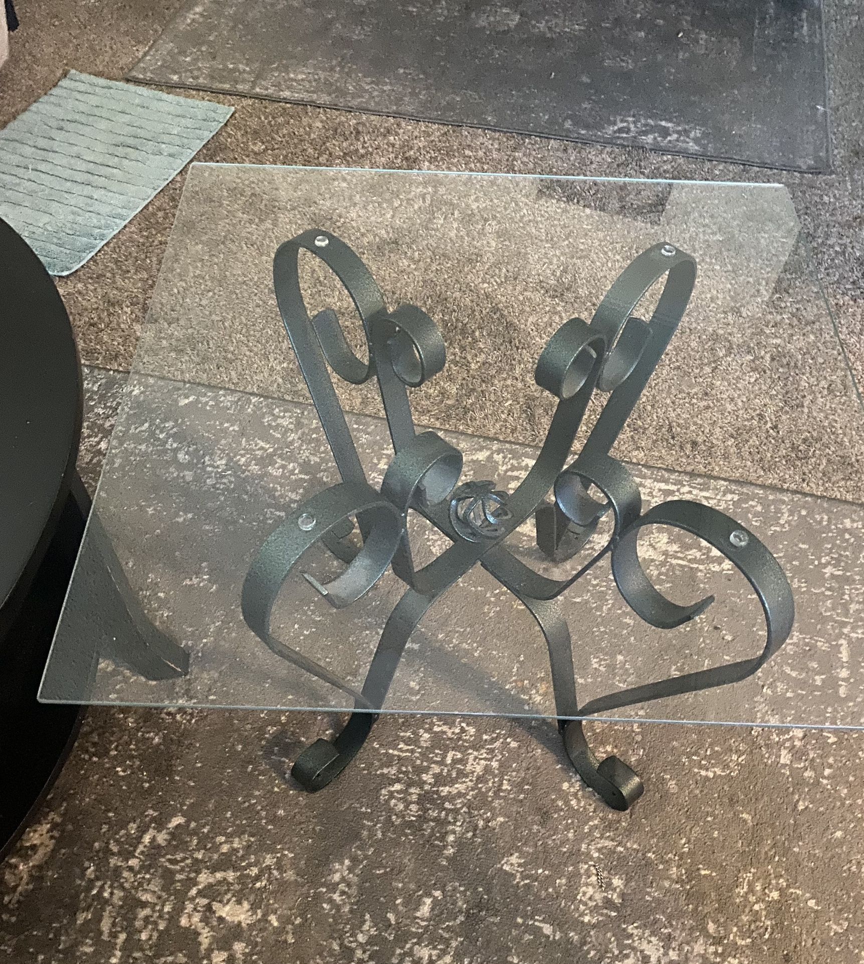 Vintage pair of wrought iron indoor outdoor glass top end tables. Great condition very sturdy.