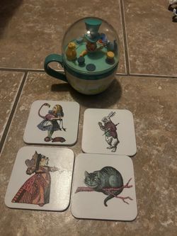 Disney parks Alice in wonderland coffee mug with mad hatter topper with 4 coasters.