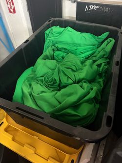 Pile of green screen drape