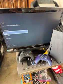 Xbox Series X with 2 controllers