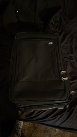 22x14x9-This black suitcase is a Victorinox softside