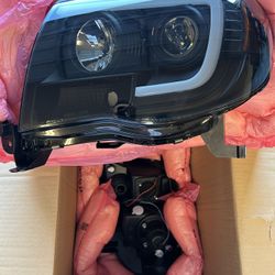 2005-2011 Toyota Tacoma Signature  Black Projector Headlights With LED Strip
