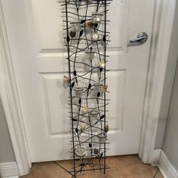 wall-mounted metal votive candle holder