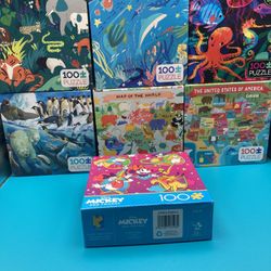 7 Complete 100 piece Puzzles