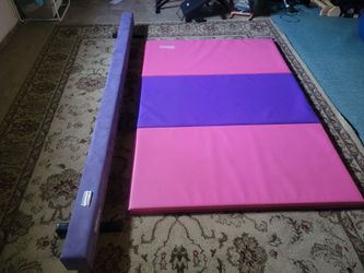 Gymnastics bar and mat