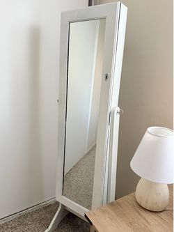 Jewelry mirror armoire