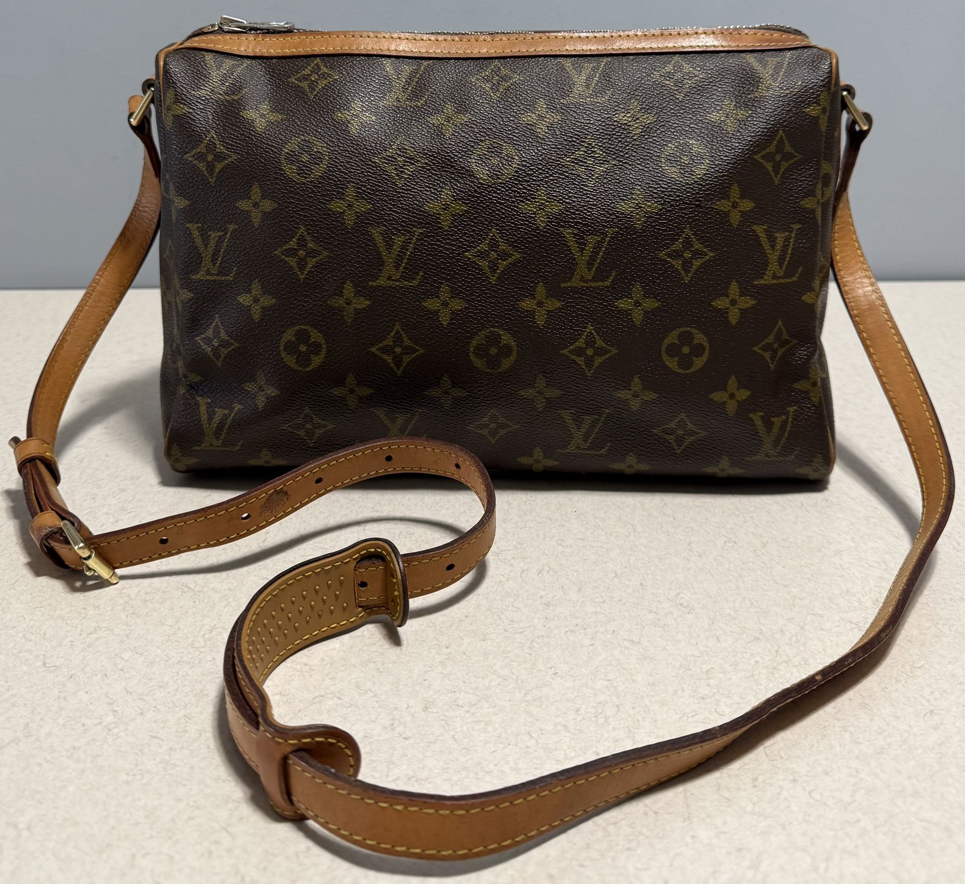 LOUIS VUITTON Vintage Tuileries Monogram Canvas Leather