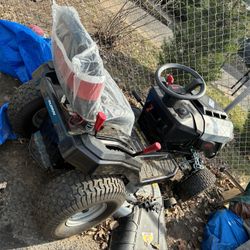 Sit down Lawnmower along with Trailer 