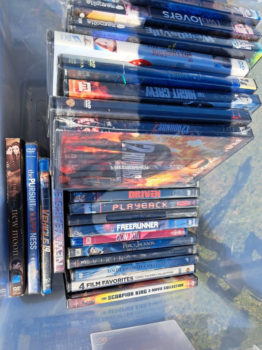 Plastic Container With Brand NEW DVD's
