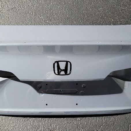Honda civic 2022-23  Trunk lid OEM part. Super minor Dent.