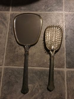 Old mirror and brush