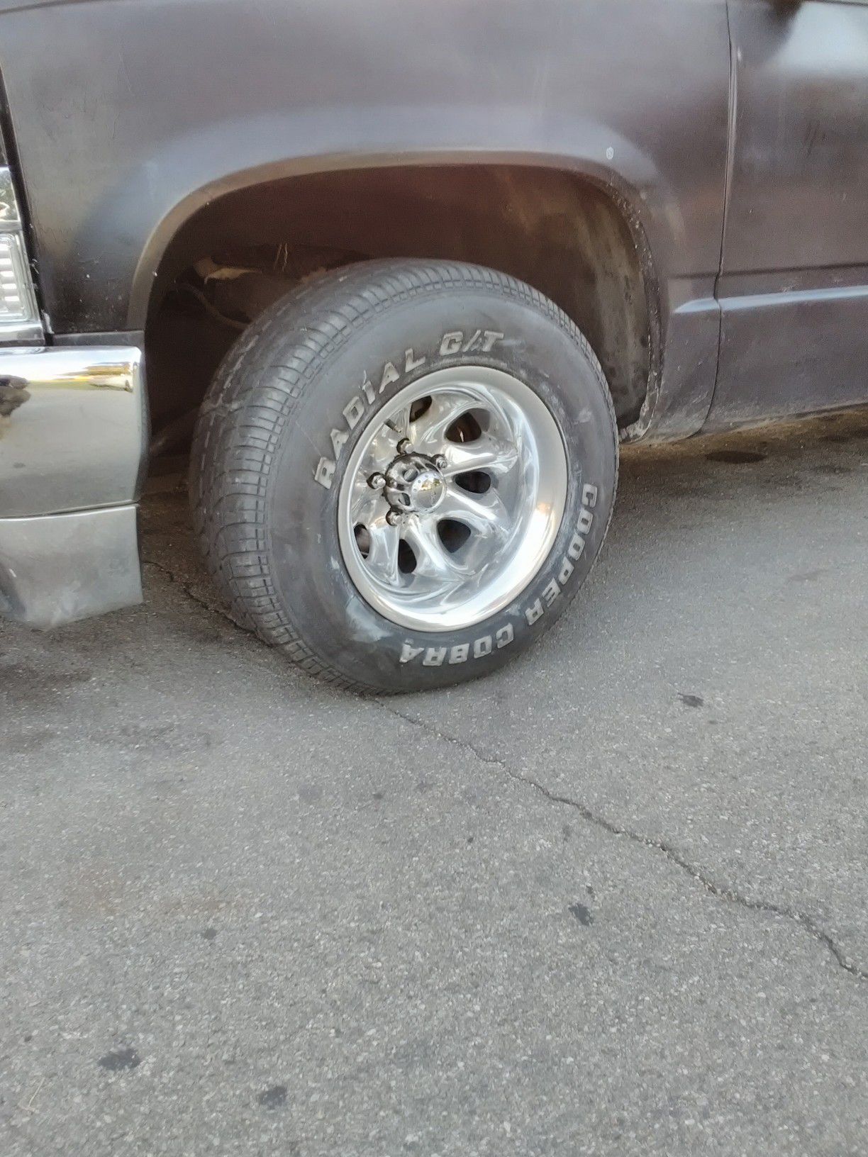 15x10 wheels 5x5 Chevy truck tires 40% 3 caps for Sale in Dallas 