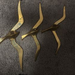 Set of three wall sculptures of brass flying seagulls, Mid-Century Modern style