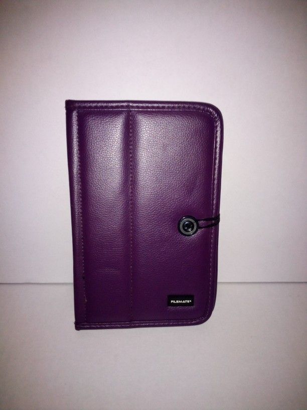 Perfect purple faux leather tablet case/protector. Will hold 8"tablet. All of the elastic is in excellent condition. Excellent grip.