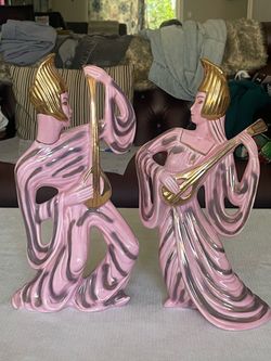 A pair of vintage pink and gold Art Deco ceramic figurines playing musical instruments. Each 12”-13”  tall