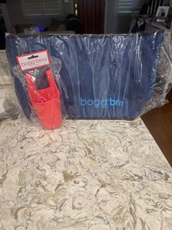 Brand new in bag still I have a navy blue insulated  both brrr bag with cup holder (pink)