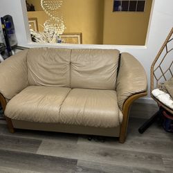 Free leather tan love seat