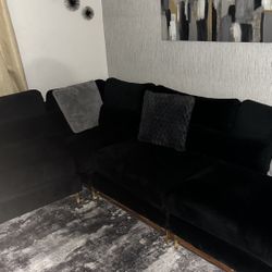 Black L Section Couch With Gold Legs