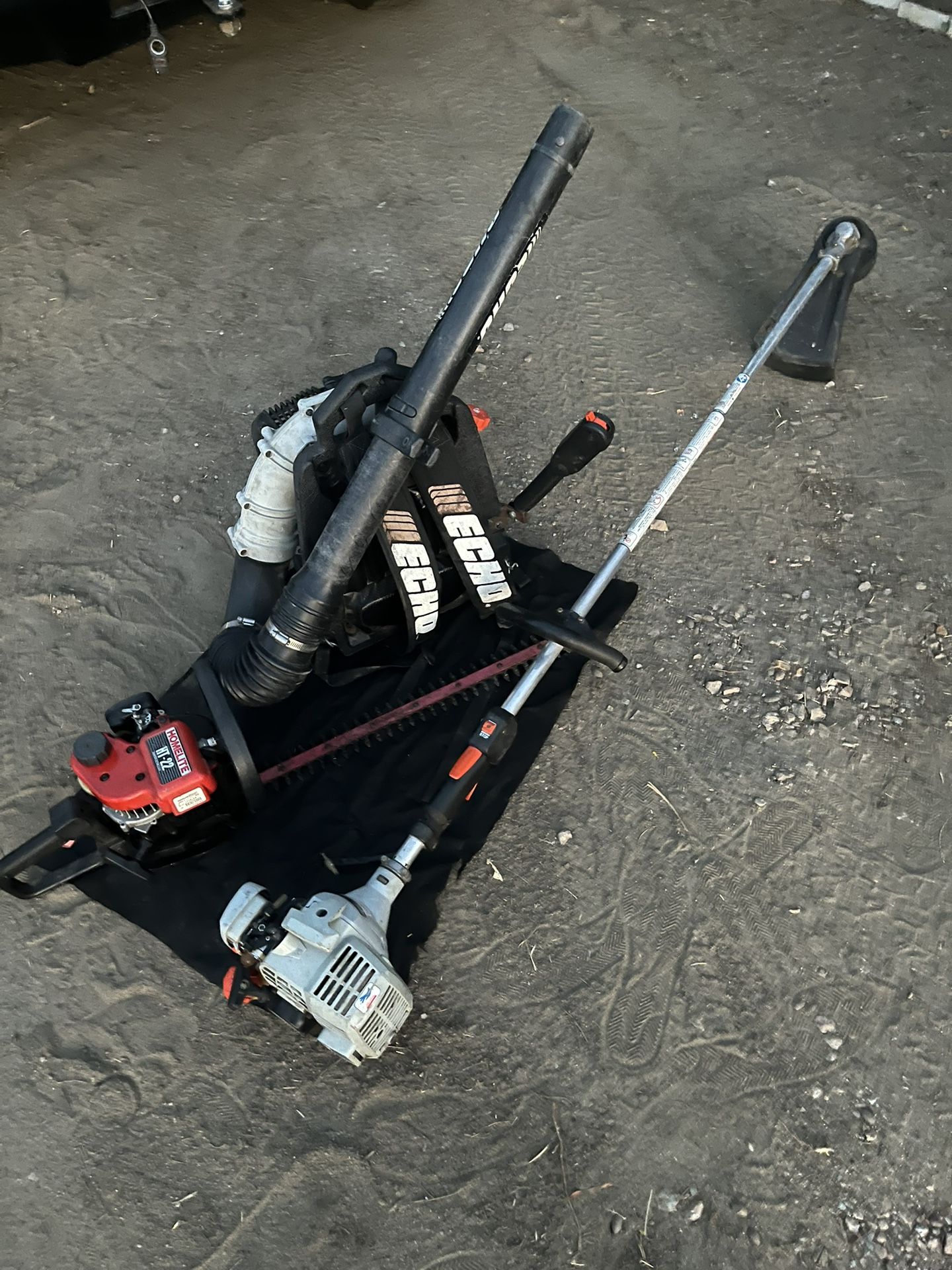 Echo Backpack Blower, Echo Weed Wacker, Homelite Trimmer.