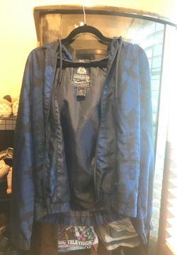 1,500mm Waterproof rated windbreaker. Made by American Rag. Men’s small. $5