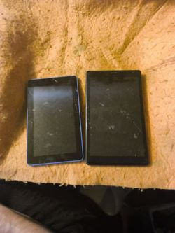 Tablet and one kindle being sold as is where is read full description will not separate