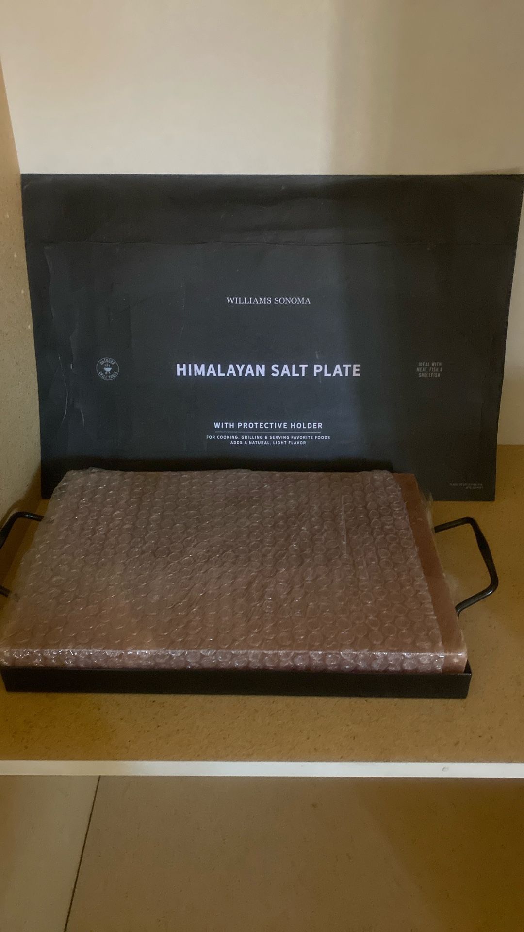 Brand new Himalayan salt plate with protective holder for cooking grilling and serving