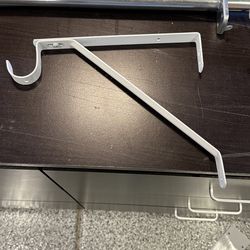 Closet rod supports and closet rods