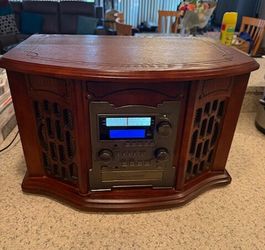 5-in-1 Wooden Music Center System (Like NEW) combines a vinyl record player, a CD recorder, a cassette tape deck, and an AM/FM radio The Innovative Te