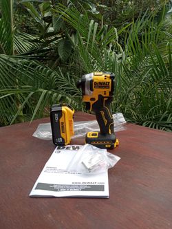 DeWalt 20 v new atomic. Impact.  3 speed.    W. battery.   5.0.  ah