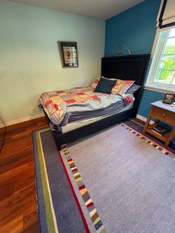 Black Upholstered Bed Frame with Nailhead Trim