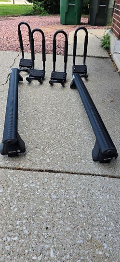Rhino Roof Rack and Four Carriers