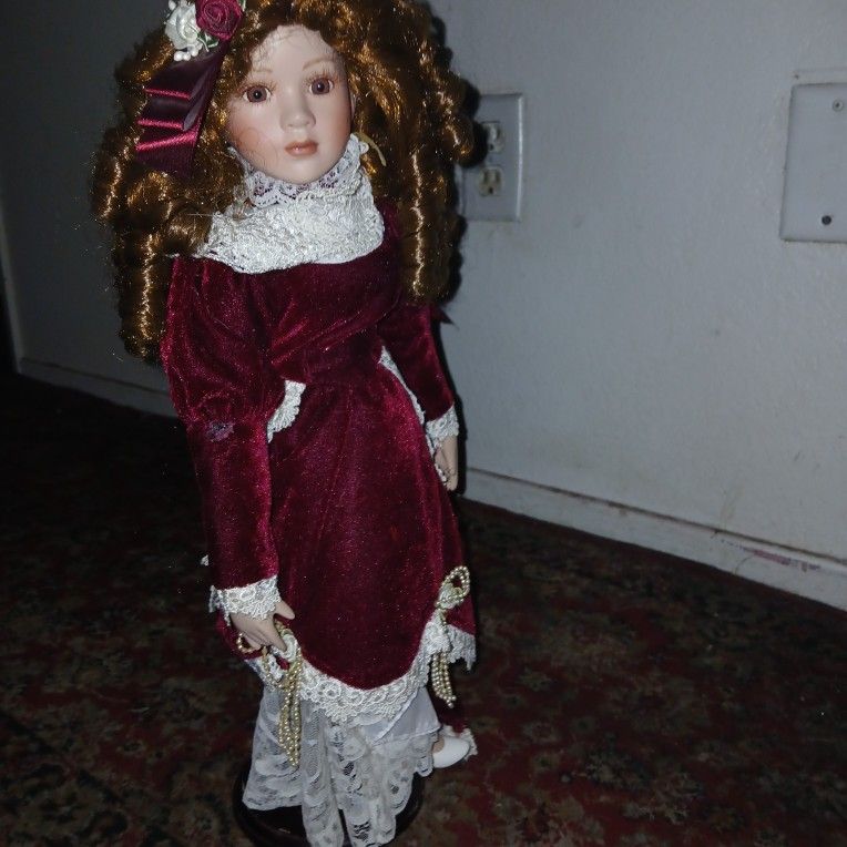 Porcelain Doll w/Red Velvet Dress