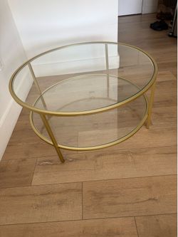 Glass coffee table with gold trim