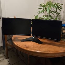 2 like New monitors with stand and all cables included as well!