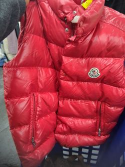 Moncler Red Puffer Vest / Bodywarmer [Insert Size, e.g., Size 2 / M]  ​Brand: Moncler  
​Style: Puffer Vest / Sleeveless Down Jacket  
​Color: Bright 
