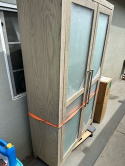 Tall Wood Cabinet with Glass Doors